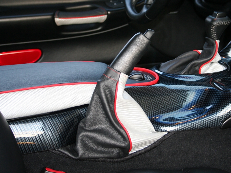 Shift boot with piping